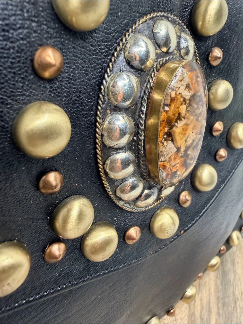 Black Studded Leather Wristlet Clutch with Decorative Centerpiece